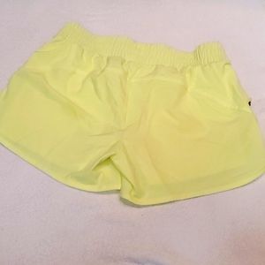 Neon yellow running shorts small